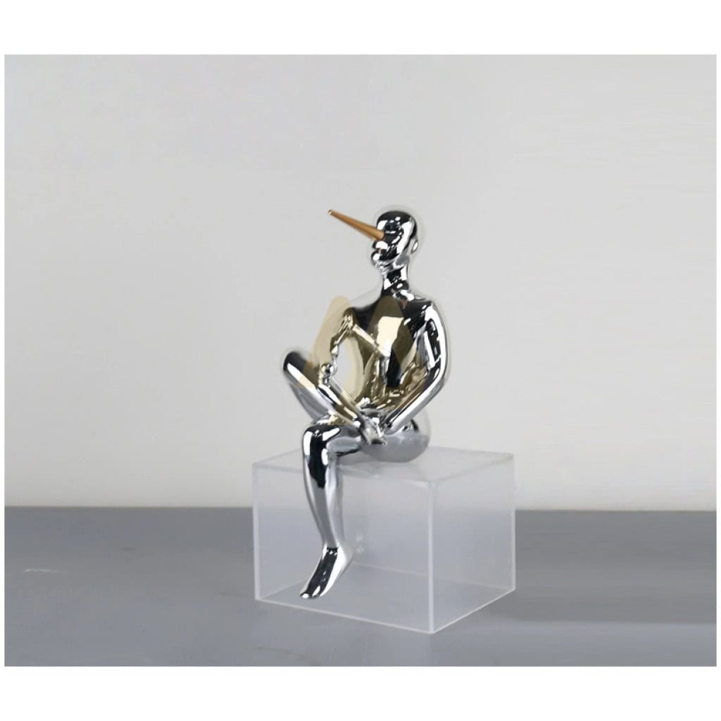 Silver Sitting Pinocchio Ornament